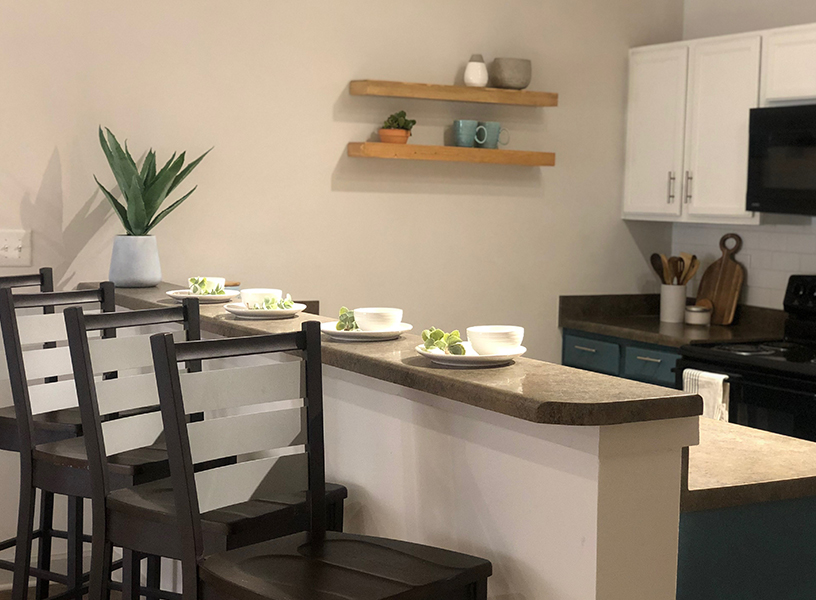 A set countertop with two stools